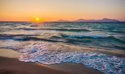 Beautiful beach sunset with no people. Marmari, Kos island, Greece. Dodecanese islands, Aegean Sea. - obrazy, fototapety, plakaty