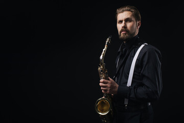 Fototapeta na wymiar Musician playing jazz on saxophone