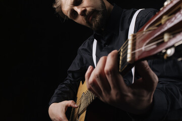 Fototapeta na wymiar Talented musician playing guitar
