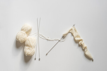 flat lay knitting supplies equipment, handmade wool clothes