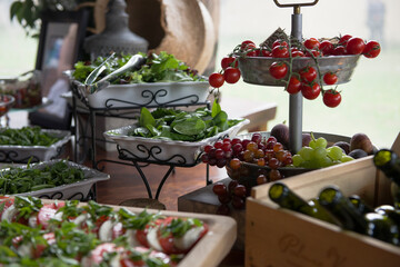 Food set up with Italian salad and grapes