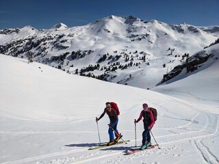 Ski tours in the Glarus region. Pure winter landscape with the ascent trail and blue sky. Winter Sport. mountaineering