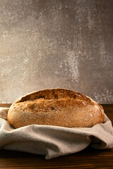 Wholegrain rye bread on a cutting board