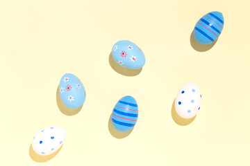 Easter eggs decorated painted minimal abstract concept sunny day