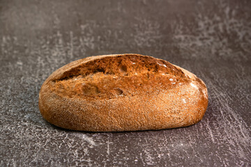 Wholegrain rye bread on a cutting board