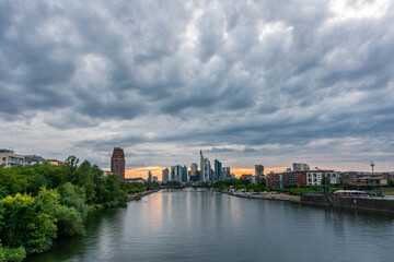 Fototapeta premium FRANKFURT, GERMANY, 25 JULY 2020: View on the financial district with Main river in Frankfurt city