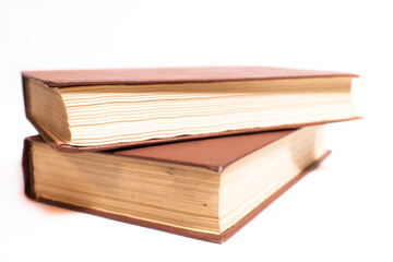 Two old vintage books isolated on white background