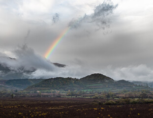 rainbow over the hills