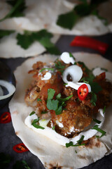 Meat on pita bread. Vegetables and pickles. Ramadan concept. Turkish and Arabic dish. Kebab on pitta lavash.