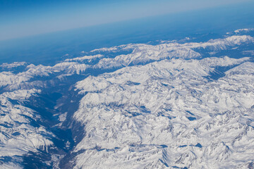 Fototapeta na wymiar aerial image of snow covered mountains