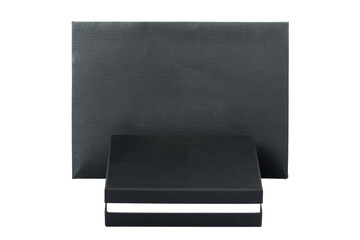 label cardboard box and a package of design paper in black color packaging mockup for fashion gifts isolated objects on white background.