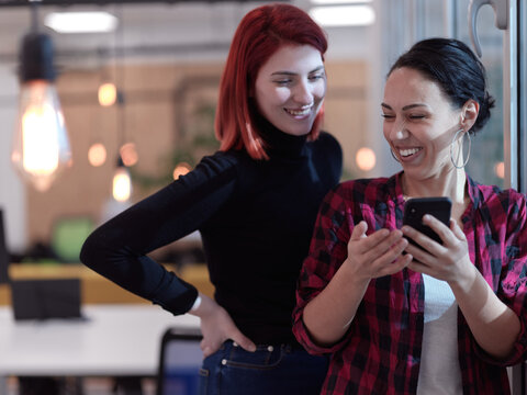 female friends discussion about project at moder coworking office