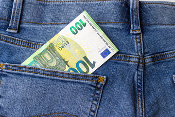 Euro banknote money saved in the back pocket of the jeans.