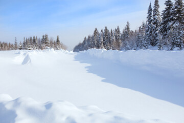 Fototapeta na wymiar winter snowy road in the forest