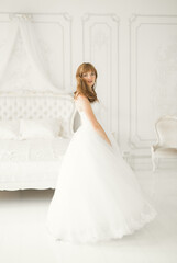 Beautiful luxury bride in elegant white dress