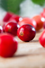 red ripe divided cranberries on the table, homemade cranberries