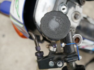 closeup of container of motorcycle brake fluid.