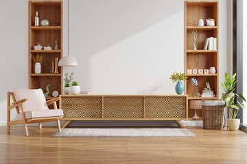 Cabinet for TV on the white wall in living room with armchair,minimal design.