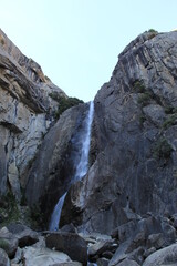 Fototapeta na wymiar Valley View of Mountain Waterfall in Yosemite National Park, California
