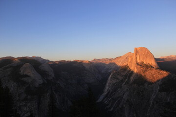 Fototapeta na wymiar Sunset Half Dome view from Glacier Point in Yosemite National Park, California