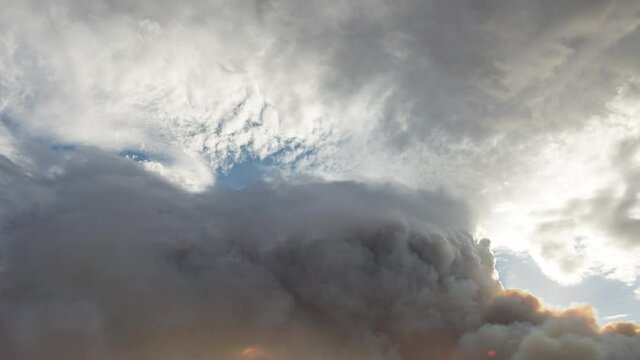 Close up time lapse of a large Pyrocumulus cloud forming and decaying above a bush fire in the Adelaide Hills