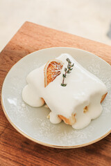 Homemade lemon cakes with lemon and whipped cream. Healthy organic summer dessert cake.