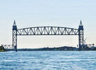 Cape Cod Canal Railroad Bridge,  a vertical lift bridge in Bourne, Massachusetts near Buzzards Bay.   Constructed in 1935 as part of the WPA  to put Americans back to work during the Great Depression.