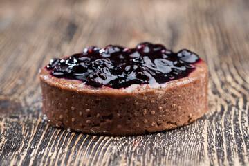 fruit tartlet with milk cheese filling and lots of blueberries