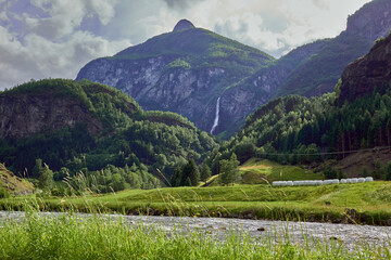 River and mountains of Flamsdalen valley in a sunny day