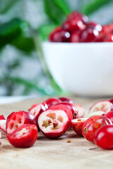 red ripe divided cranberries on the table, homemade cranberries