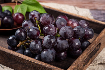 Close up of a bunch of purple grapes
