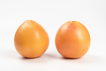 Fresh grapefruit isolated on white background