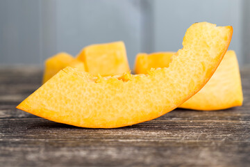 ripe orange pumpkin cut into pieces