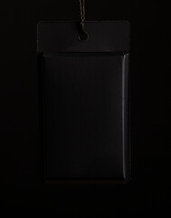 a black label that can be hung on clothes