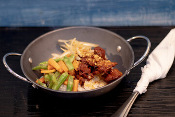 Rice with adobo chicken toppings