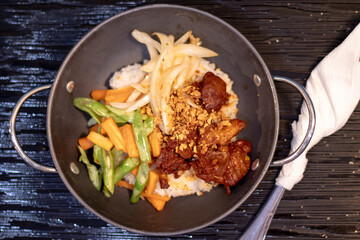 Rice with adobo chicken toppings