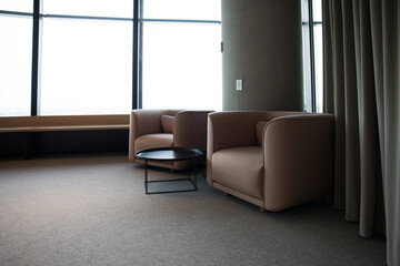 lounge coffee table sleek modern interior window natural simple minimal neutral carpet office