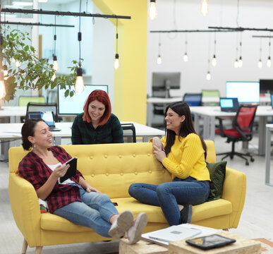 female friends discussion about business project at moder coworking office