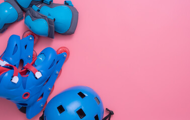 Kids rollerblade,roller skating and body parts protection on pink background,top view