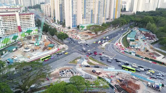 Drone shot of traffic junction with construction works, Singapore