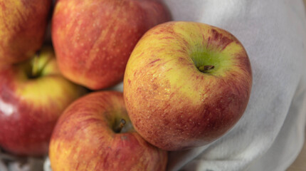 Fototapeta na wymiar Apple fruits in wooden basket on neutral background.