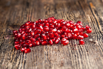 red delicious grains of ripe pomegranate, sweet and sour taste