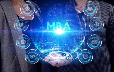 Business, Technology, Internet and network concept. Young businessman working on a virtual screen of the future and sees the inscription: MBA