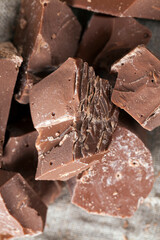 divided into pieces a piece of chocolate from cocoa
