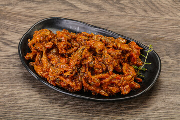 Canned anchovy in tomato sauce