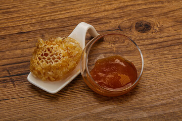 Natural honey in the bowl