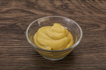 Dijon mustard sauce in the bowl