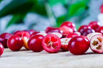 cut red cranberry berries divided into slices