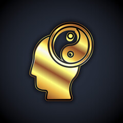 Gold Yin Yang symbol of harmony and balance icon isolated on black background. Vector