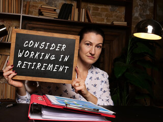 Fototapeta premium Business concept meaning CONSIDER WORKING IN RETIREMENT with sign on the board